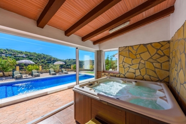 Bonita casa con Jacuzzi y vistas a las montañas en Arenas