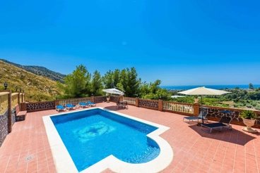 Ferienhaus mit Terrasse mit Meerblick