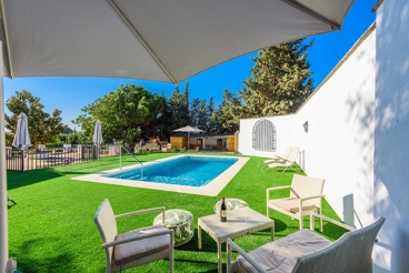 Quaint holiday villa with spacious bedrooms and a nice patio in Seville province