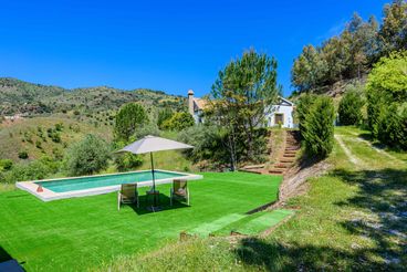 Casa rural con barbacoa y aire acondicionado en Guaro