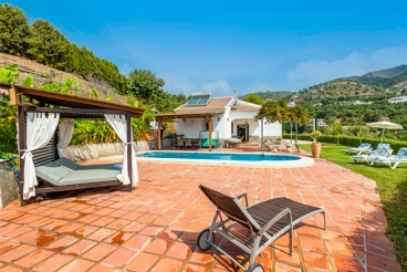 Maison de vacances avec jacuzzi extérieur et lit balinais