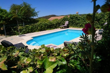 Holiday Home with fireplace and swimming pool in Berrocal