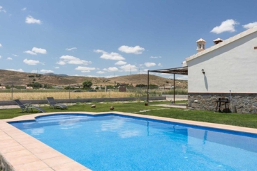 Casa rural con piscina y vistas a Sierra Nevada en El Padul