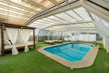 Vakantiehuis met jacuzzi en verwarmd zwembad in Atarfe