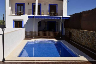 Holiday home with swimming pool and stone barbecue in Cardeña.