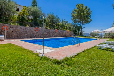 Maison avec 4 lits, joli extérieur et piscine partagée