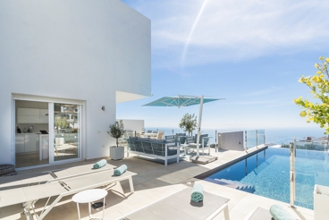 Casa de vacaciones cerca de la playa con piscina y vistas al mar en Salobreña