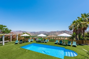 Lovely house with playground for the children and ping-pong table.