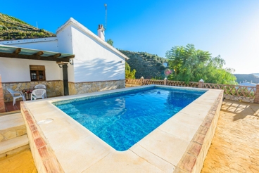 Traditional white villa with stunning mountain views and pool